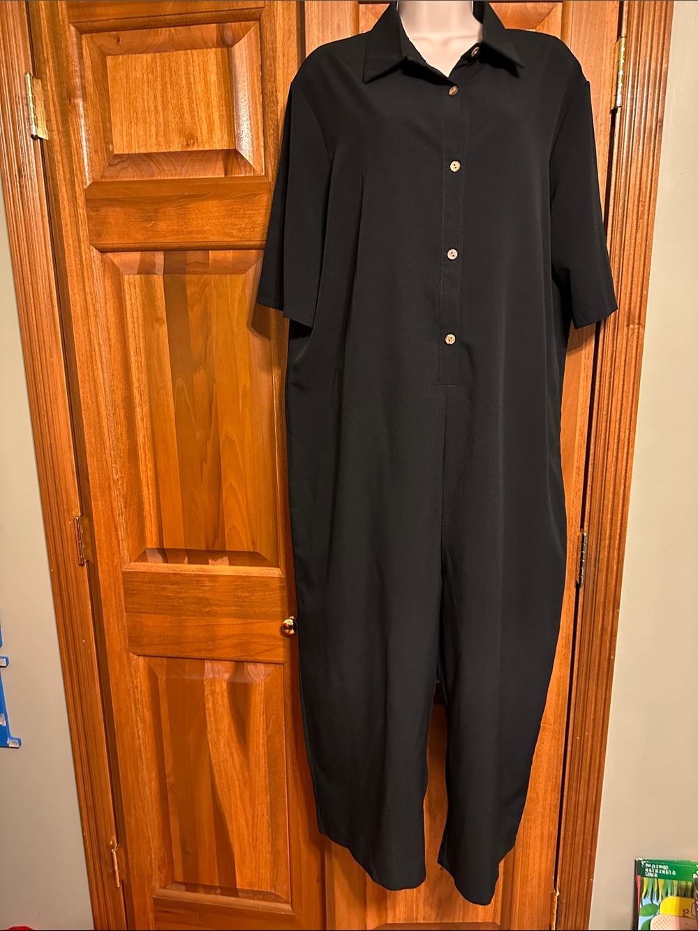 Minimalist Black Short-Sleeve Button Jumpsuit